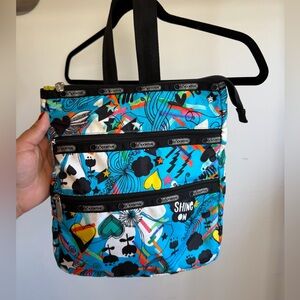Lesportsac Turquoise Graphic Messenger Bag with Multicolor Accents